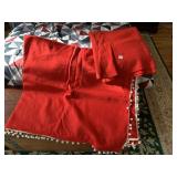 LARGE PC. FELT RED AND RED TABLECLOTH W/ BALL