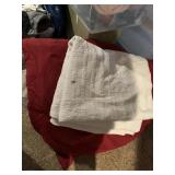 WHITE BED SPREAD AND RED COMFORTER