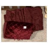 BURGUNDY TABLECLOTHS AND VELOUR FRINGED TABLE