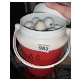 DRINK COOLER FULL OF GOLF BALLS