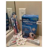 WATERPIK WATER FLOSSER, NEW TOOTHBRUSHES, FLOSS,