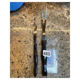 1 CUTCO STEAK KNIFE 1759 AND CUTCO MEAT FORK 1727