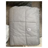 YMN WEIGHTED BLANKET, FEELS ABOUT 12 LBS.