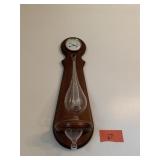 BAROMETER AND GLASS POURING MOUNTED TO WALL