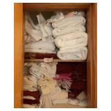 CONTENTS OF HALL CLOSET LINENS AND TOWELS ETC.