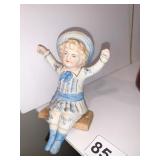 GERMAN BISQUE SWINGING GIRL 5" H X 2.5" W