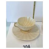 BELLEEK GREEN MARKING SHELL SHAPE CUP/SAUCER 0857