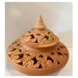 CLAY CANDLE HOLDER 5" H X 5.5" W HAS BEEN