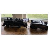 LIONEL POST WAR ENGINE AND TENDER AND 3 STOCK