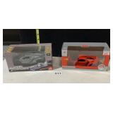 LOT OF 2 DIE CAST SPORTS CARS IN BOXES 1 GRAY 1