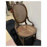 CANED BACK ROCKER AND SEAT SM. DAMAGE AREA BACK