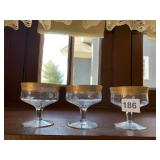 3 CHAMPAGNE GLASSES W/ GOLD RIMS