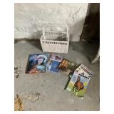 WICKER MAGAZINE RACK WITH MAGAZINES AND BOOKS