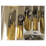 YELLOW FLATWARE AND MEASURING SPOONS
