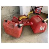 4 GAS CANS 1 METAL
