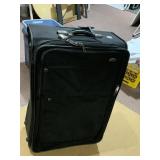 LARGE SAMSONITE ROLLING SUITCASE