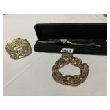 2 BRACELETS AND FAUX PRECIOUS TONE SURROUND WATCH