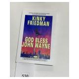 AUTOGRAPHED EDITION OF "GOD BLESS JOHN WAYNE" BY