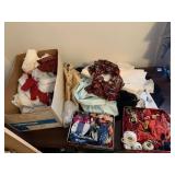 2 LARGE TINS OF EMBROIDERY FLOSS AND FABRIC