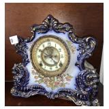 CLOCK PORCELAIN MARKED RADICAL ON THE BACK,11" H