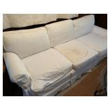 UPHOLSTERED SOFA WITH WHITE COVER DOES HAVE STAIN
