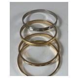 THREE GOLD TONE MONET BANGLE BRACELETS ONE