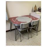 RED FLOWER DESIGN TABLE AND 2 MATCHING CHAIRS