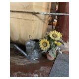 WATERING CAN AND SUNFLOWER