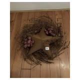 WREATH WITH METAL STAR DECORATION
