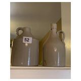 TWO CROCKS 7" AND 8" TALL ONE WITH CHIP