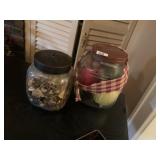 TWO GLASS JARS. ONE WITH ARTIFICIAL FRUITS