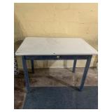 PORCELAIN TOP TABLE W/ CENTER DRAWER AND TWO