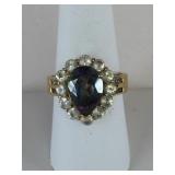 10K GOLD RONG WITH PEAR SHAPE STONE SURROUND