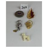 BSK LEAF PIN WITH RED RHINESTONES SILVER TONE