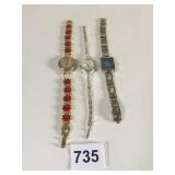 WRISTWATCH WITH LADYBUGS FACE IS FOGGY SILVER