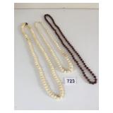 TWO IVORY COLOR BEADED NECKLACES REDDISH BROWN