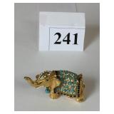GOLD TONE ELEPHANT PIN WITH BLUE STONES CLEAR