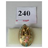 MYLU GOLD TONE METAL EGG PIN WITH BUNNY