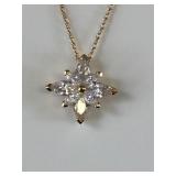 GOLD TONE CHAIN NECKLACE WITH CLEAR STONE FLOWER