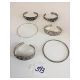 GROUP OF CUFF AND BANGLE BRACELETS SW DESIGN