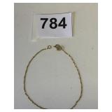 12K GOLD CHAIN BRACELET 7" LONG .58G