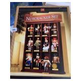 12 NUT CRACKERS IN DISPLAY CASE FROM CHRISTMAS,