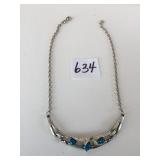 SILVER TONE NECKLACE WITH ROUND BLU STONES