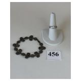 ANTIQUE BRACELET WITH ROSES AND RELIGIOUS SIGNS