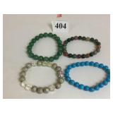 4 BRACELETS INCLUDING GLASS BEADS