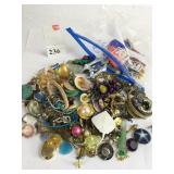 SMALL BAG OF MISMATCHED AND OR BROKEN JEWELRY