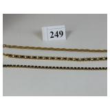 THREE GOLD TONE BRACELETS UNBRANDED BLACK STONES