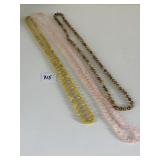 THREE STRANDS OF POLISHED STONE OR GLASS BEADED