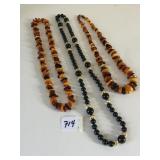 BLACK AND GOLD BEADED NECKLACE TWO FAUX AMBER