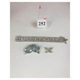 RHINESTONE BRACELET FIVE ROWS BLUE FLOWER PIN AND